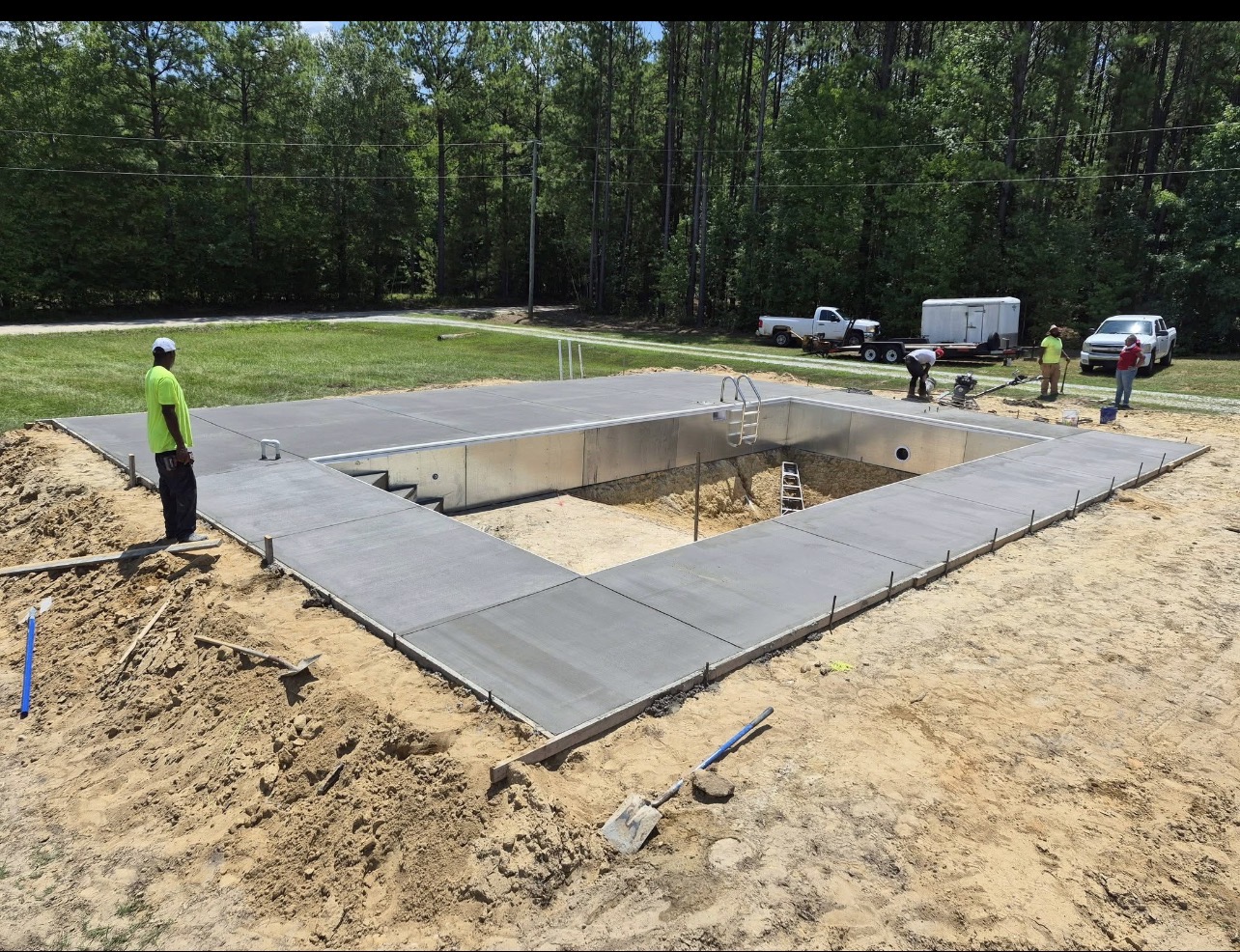 Lynell Choice's crew forming and finishing a concrete pool surround